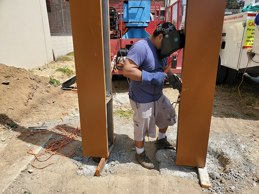 Morales Signs Graphics Installtion Poles Covers